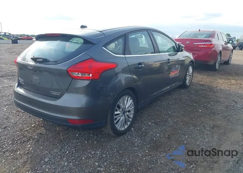 2015 Ford Focus Titanium from USA, damaged, VIN 1FADP3N27FL260899